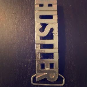 Hustler belt buckle